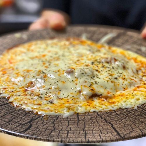 Espaguetis a la boloñesa con queso gratinado